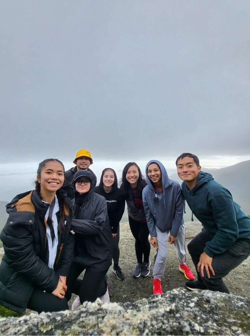 Final year Bachelor of Oral Health and Dentistry students pose for a photo at the summit of Mt. Oberon