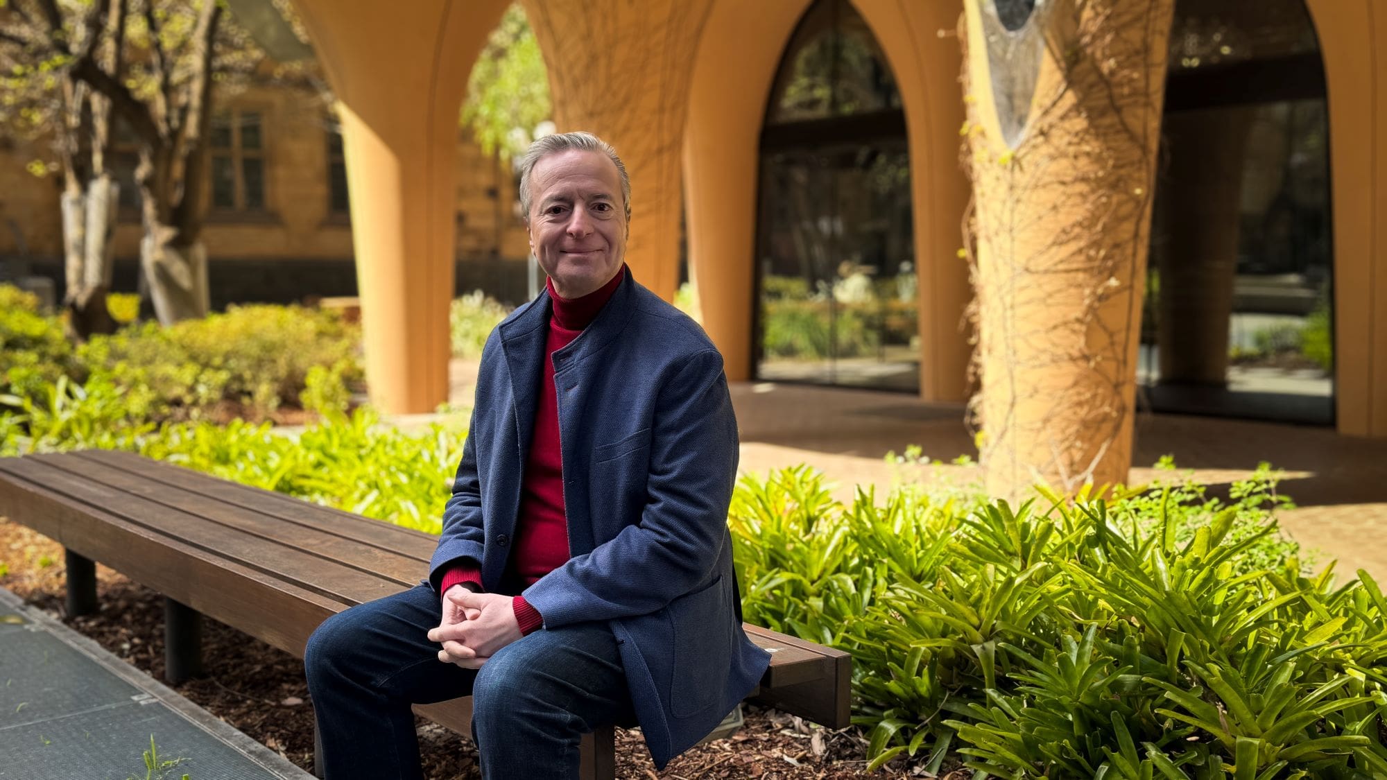 Professor Petros Papagerakis, the new Head of the Melbourne Dental School, smiles at the camera as he poses with his arms crossed
