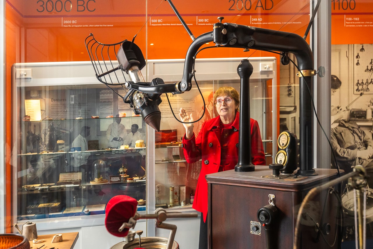 Dr Jacqueline Healy, Director Faculty Museums, Ritter X-ray machine in foreground in the Henry Forman Atkinson Museum