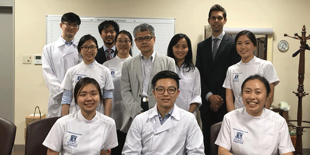 Students meeting with Dean, Professor Chikahiro Okubo, at Tsurumi University.